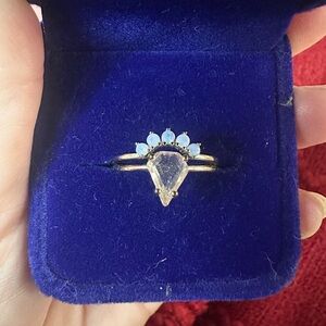 Elegant Gold Ring Set with Peachy Stone and Opal Accents